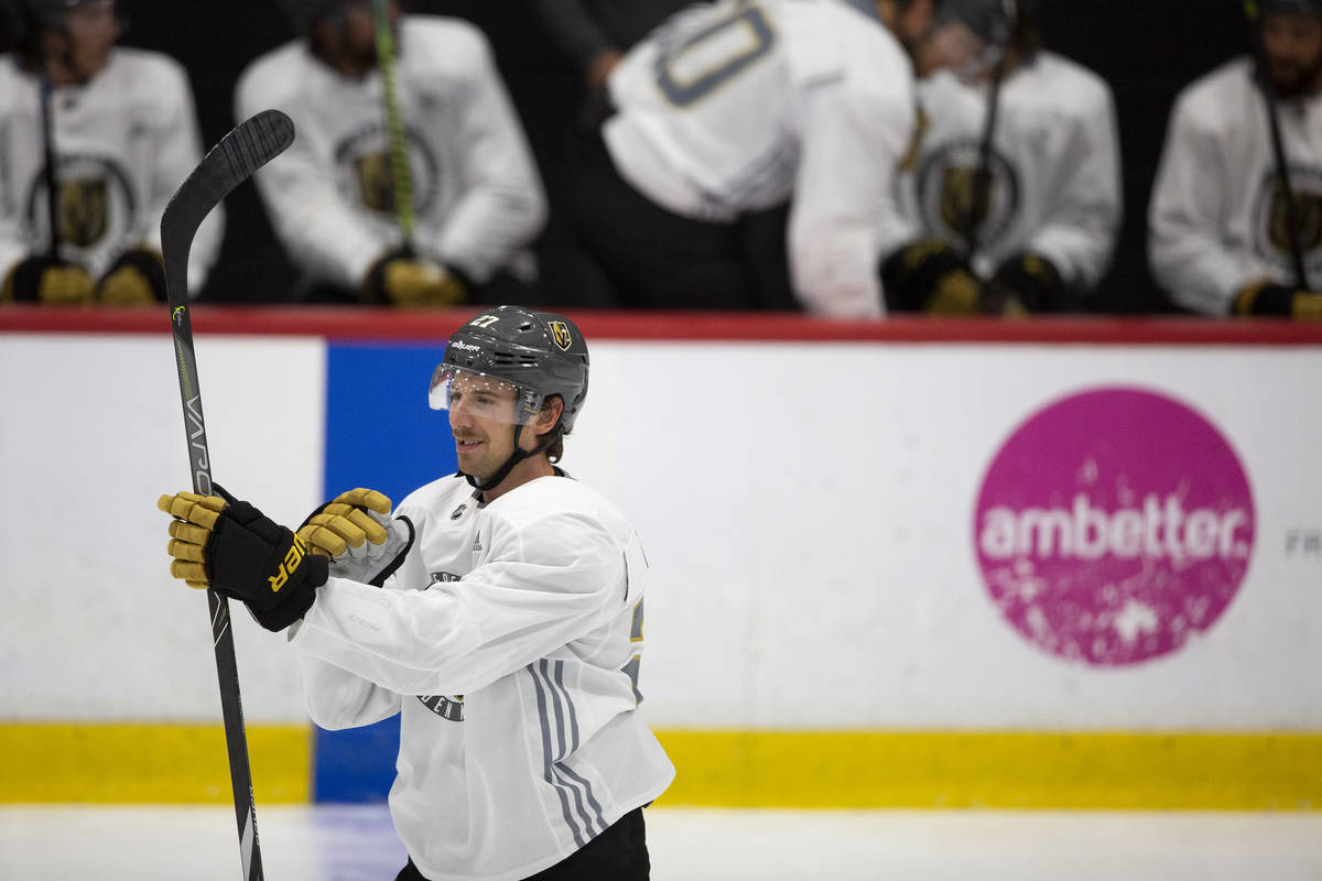 Golden Knights' defenseman Shea Theodore (27) smiles while taking the ice during practice at Ci ...