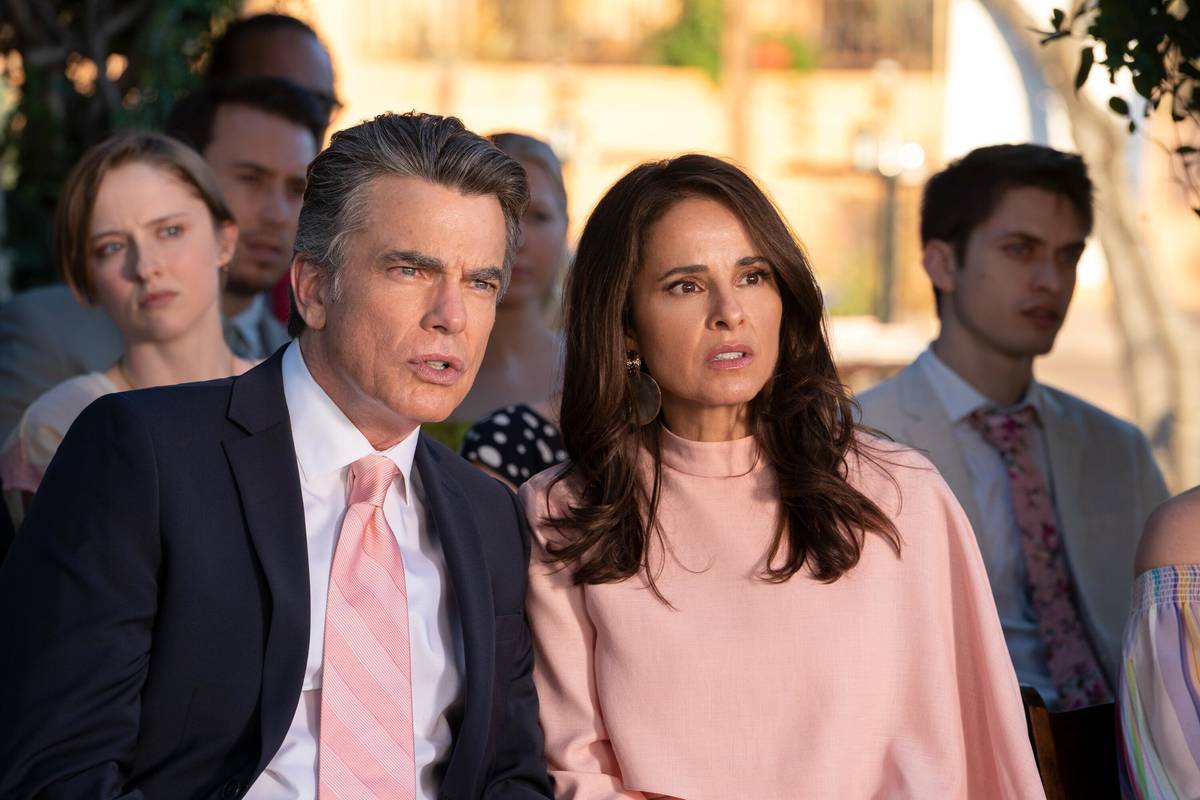 Howard (Peter Gallagher) and Pia (Jacqueline Obradors) in a scene from new movie "Palm Springs. ...