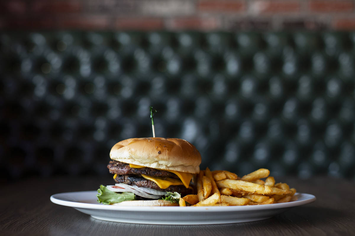 A cheeseburger from KO Sports Bar, a ghost kitchen that operates out of The Bling Pig, on Monda ...