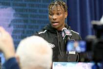 Alabama wide receiver Henry Ruggs III speaks at the NFL scouting combine at the Indianapolis Co ...