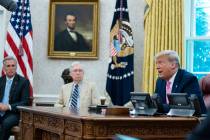 President Donald Trump speaks during a meeting with Senate Majority Leader Mitch McConnell of K ...