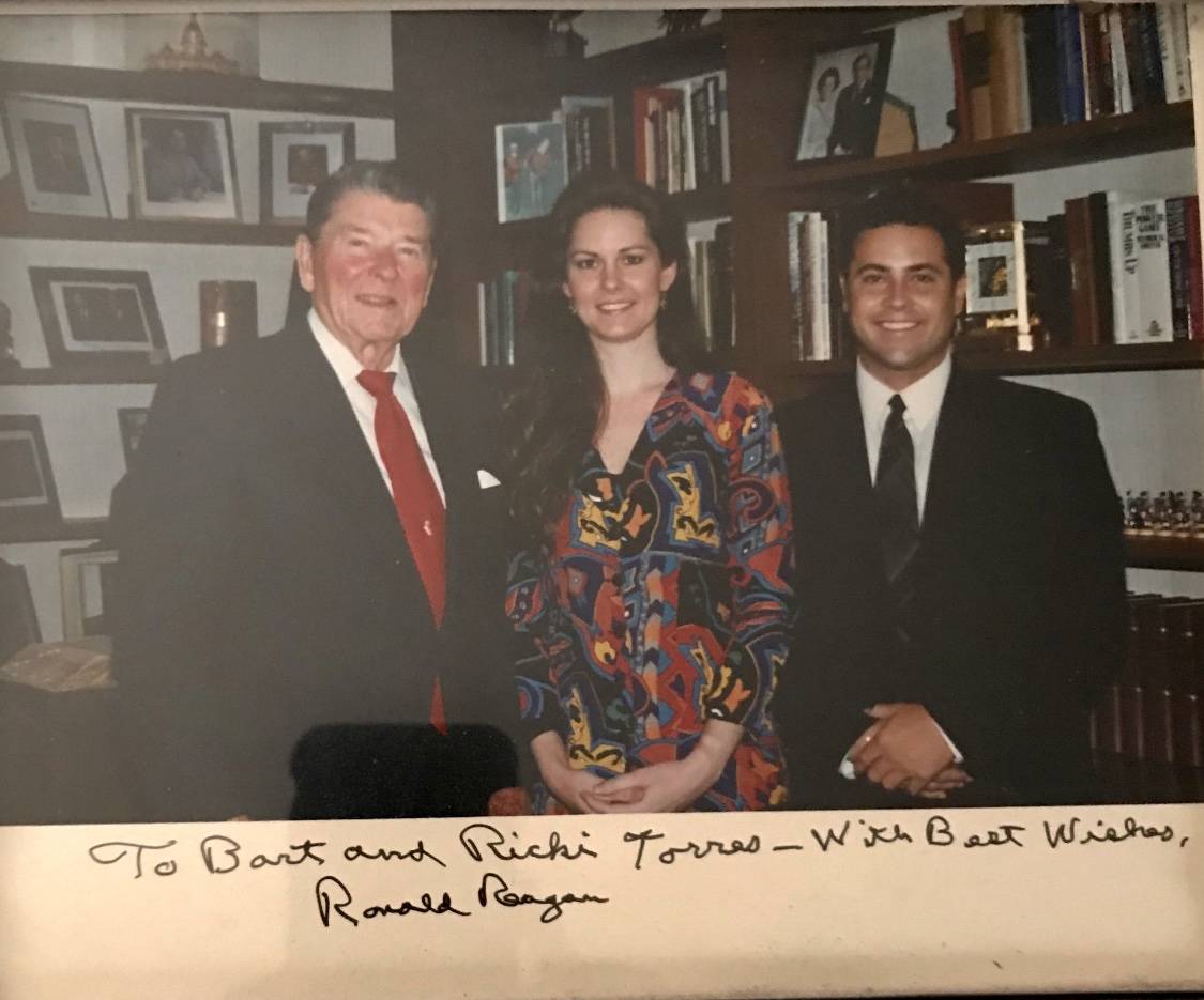 Ricki and Bart Torres are shown with President Reagan in November 1993. Torres was Reagan's vid ...