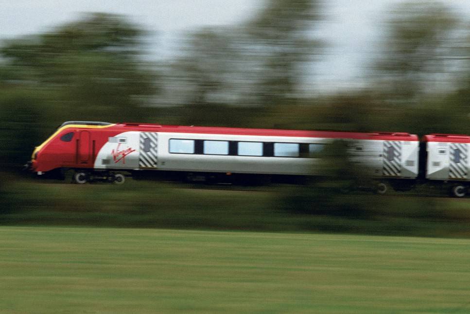 In this undated courtesy photograph, a Virgin Trains high-speed train travels between England a ...