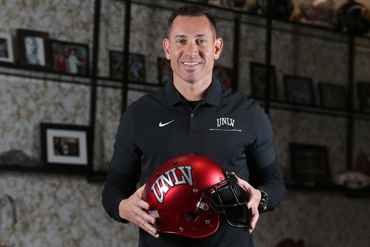 UNLV football head coach Marcus Arroyo is photographed in his office at the Fertitta Football C ...