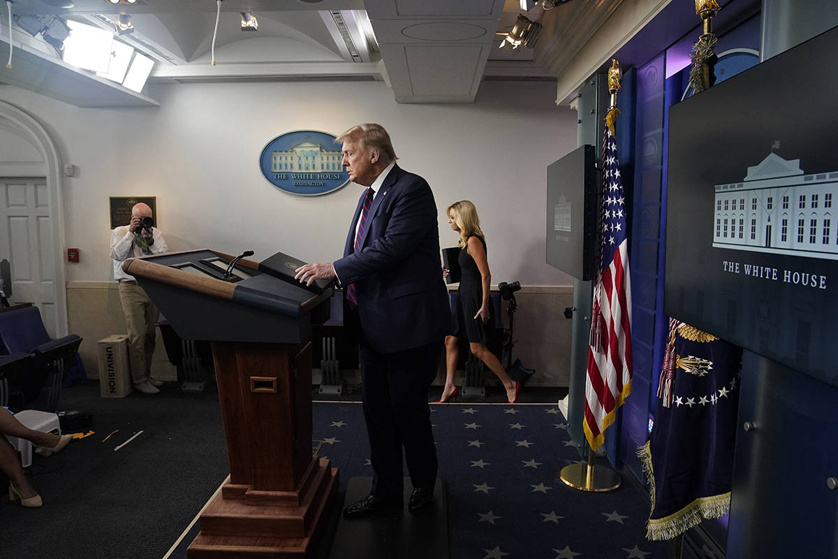 President Donald Trump arrives for a news conference at the White House, Tuesday, July 21, 2020 ...