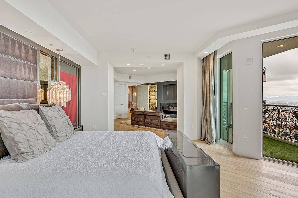 The master bedroom opens to a balcony. (Luxe Estates & Lifestyles)