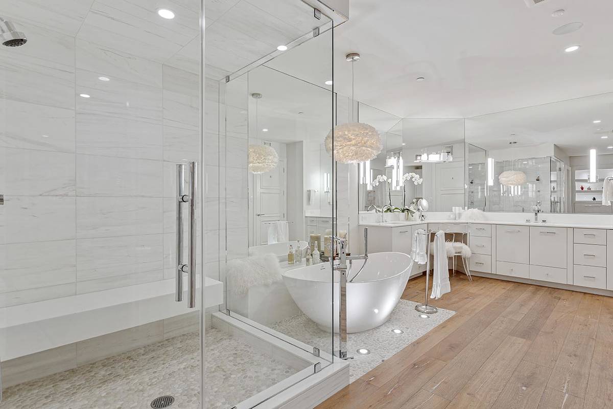 The master bath has a large shower. (Luxe Estates & Lifestyles)