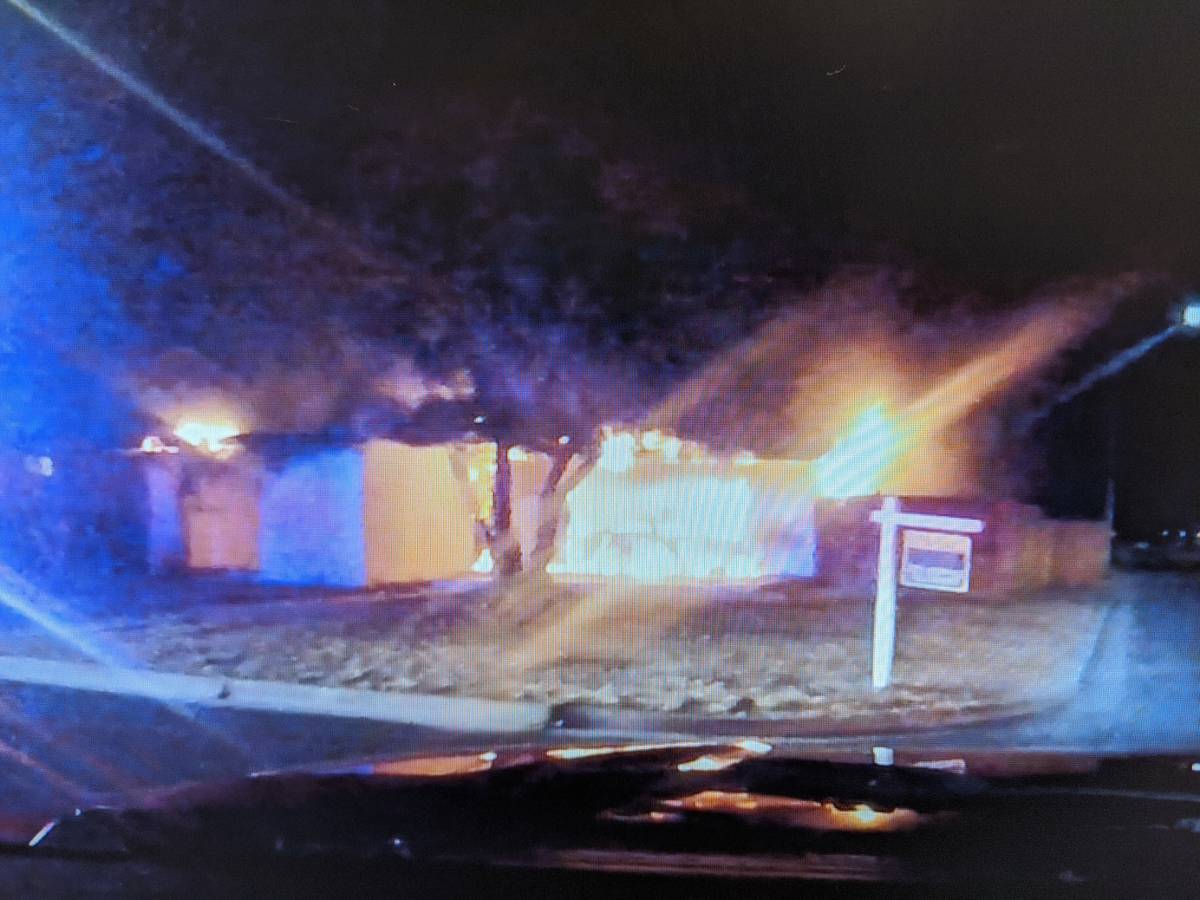 A vacant home burns in the 200 block of Elm Street in central Las Vegas on Wednesday, July 22, ...