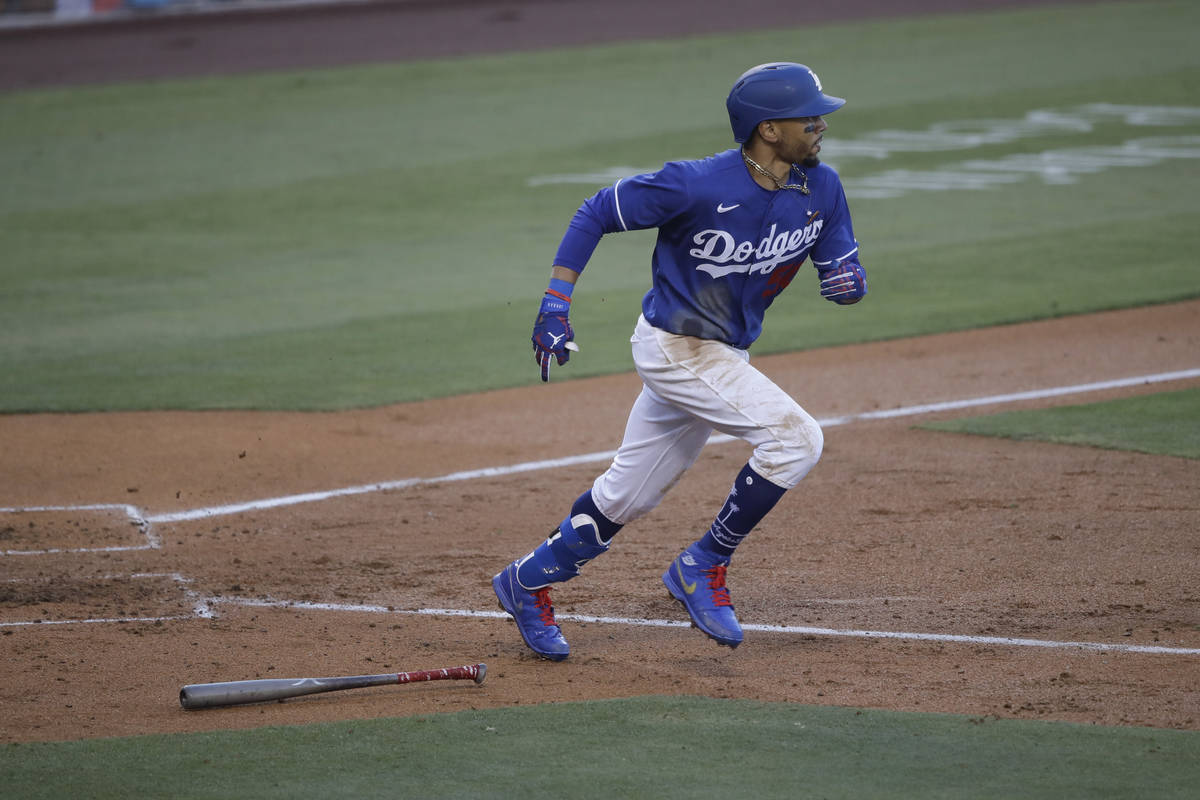 Los Angeles Dodgers' Mookie Betts lines out to center field during the fourth inning of an exhi ...