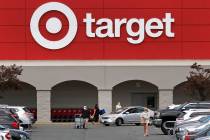 A May 15, 2020, file photo shows customers outside a Target store in Danvers, Mass. (AP Photo/ ...