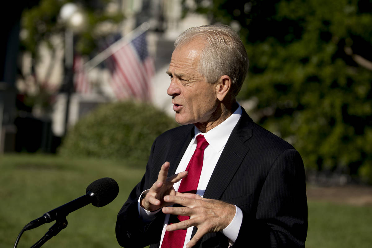 White House trade adviser Peter Navarro speaks with reporters outside the West Wing at the Whit ...