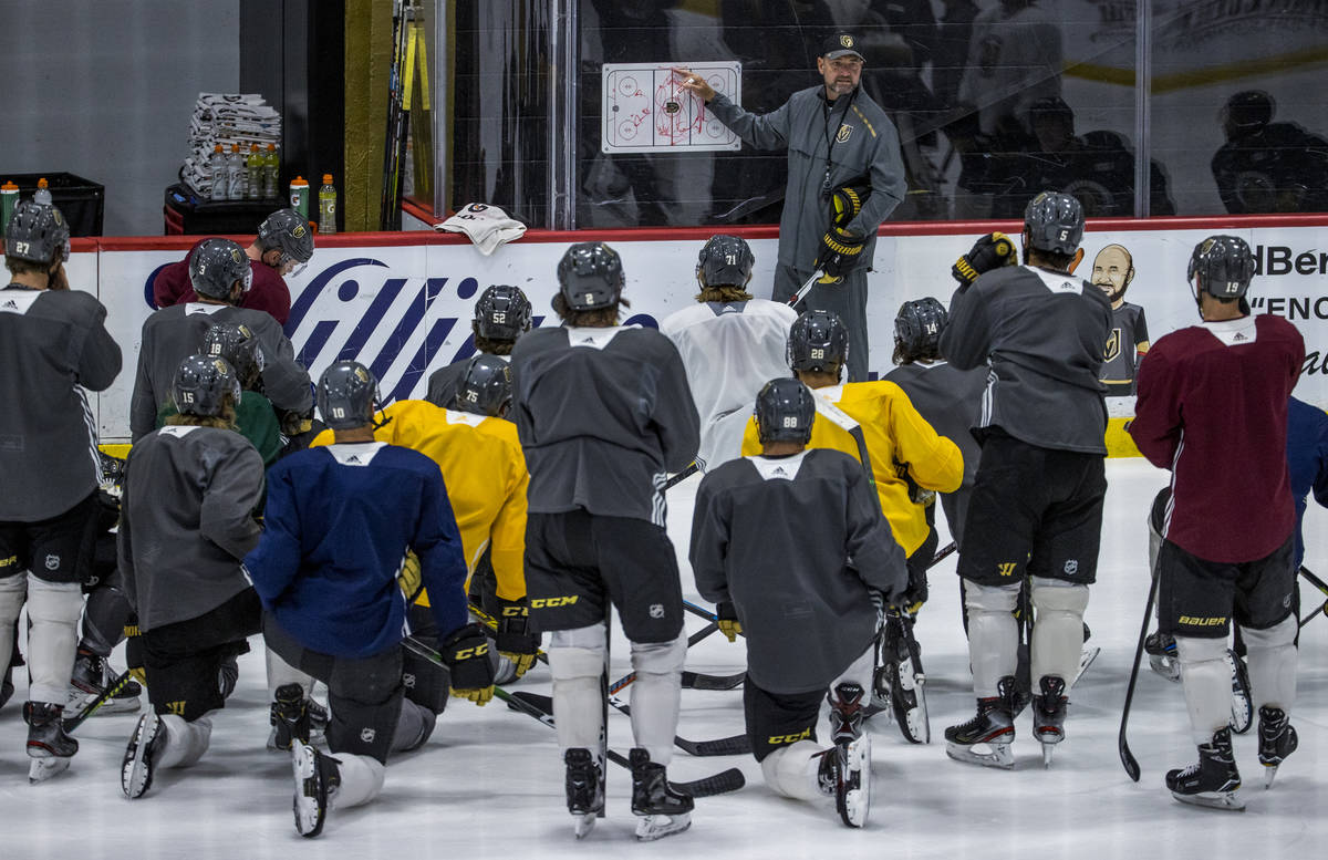 Vegas Golden Knights head coach Peter DeBoer talks about the next drill to his players during p ...