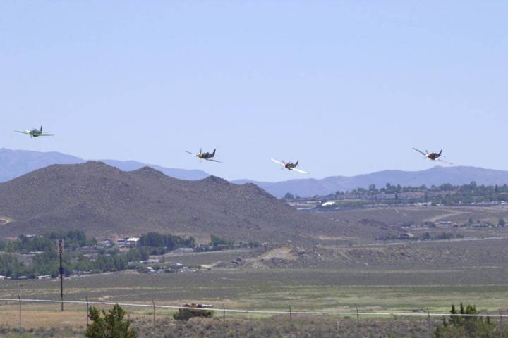 This shot shot taken at the 2002Pylon Racing School at Reno-Stead Airport. From left to right: ...