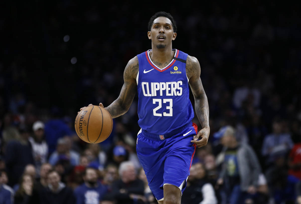 FILE - In this Feb. 11, 2020, file photo, Los Angeles Clippers' Lou Williams brings the ball up ...