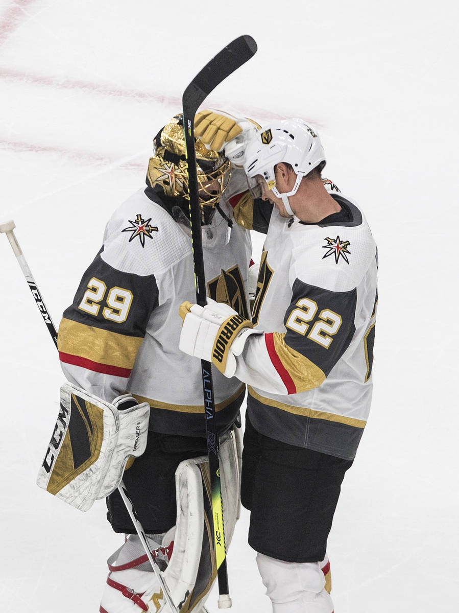 Vegas Golden Knights goalie Marc-Andre Fleury (29) and teammate Nick Holden celebrate a win ove ...