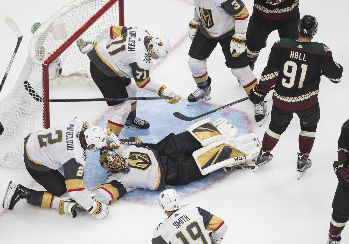 Vegas Golden Knights goalie Marc-Andre Fleury (29) gives up a goal to Arizona Coyotes Taylor Ha ...