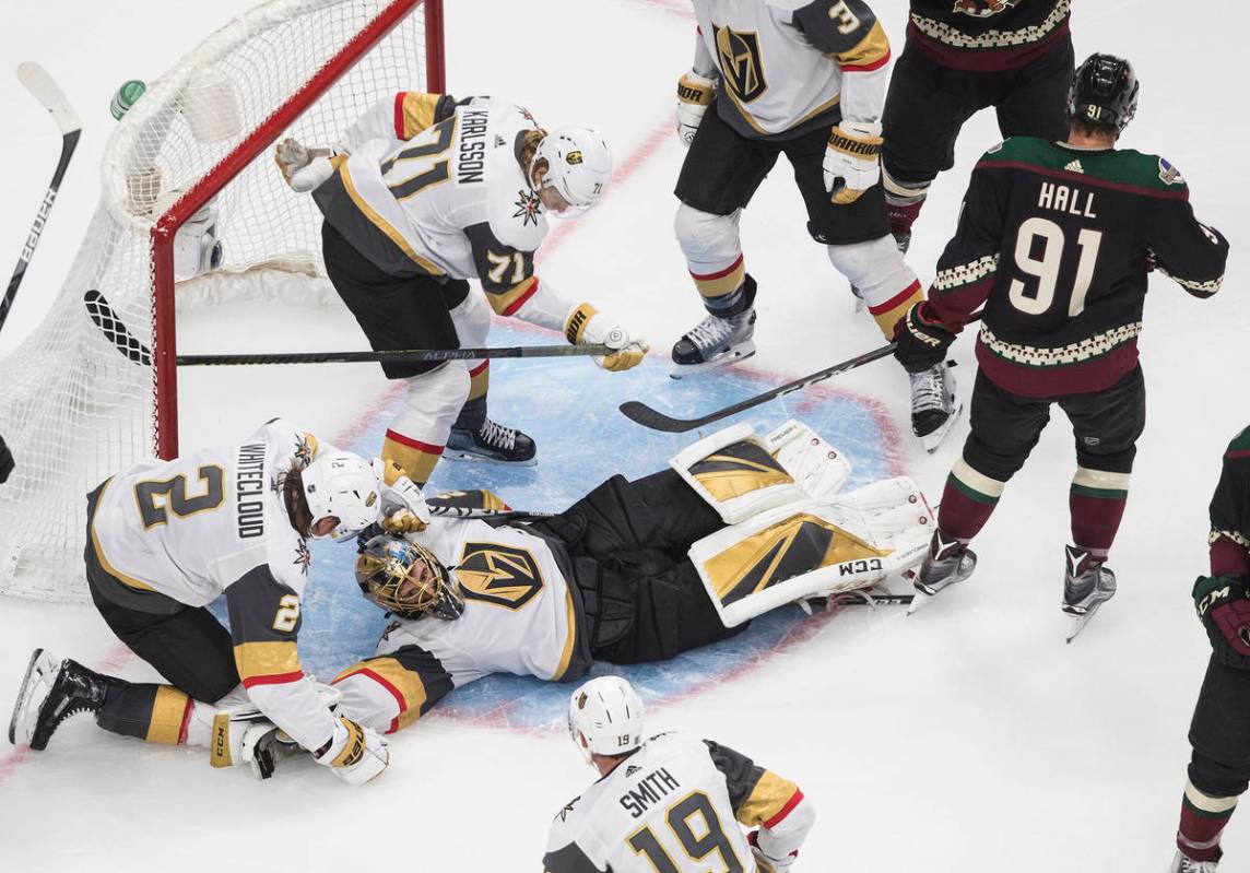 Vegas Golden Knights goalie Marc-Andre Fleury (29) gives up a goal to Arizona Coyotes Taylor Ha ...