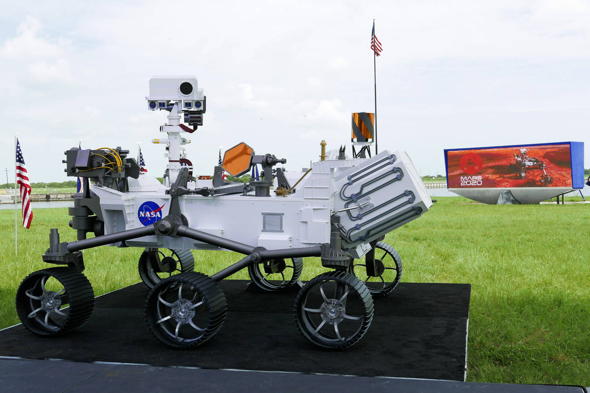 A replica of the Mars rover Perseverance is displayed outside the press site before a news conf ...