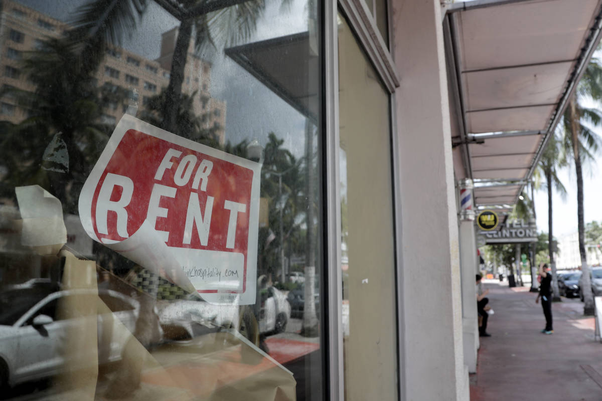 In a July 13, 2020, file photo, a For Rent sign hangs on a closed shop during the coronavirus p ...