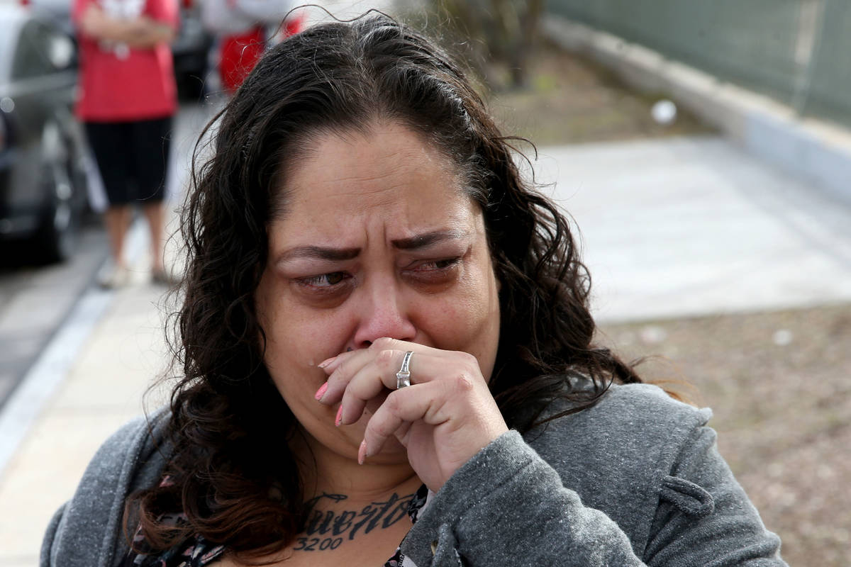 Alpine Motel Apartments co-owner Malinda Mier cries while telling the story of her maintenance ...