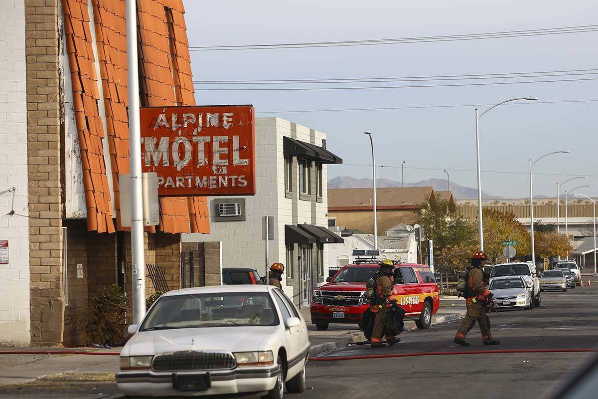 Las Vegas firefighters work a fire at the Alpine Motel Apartments, Dec. 21, 2019 in Las Vegas. ...