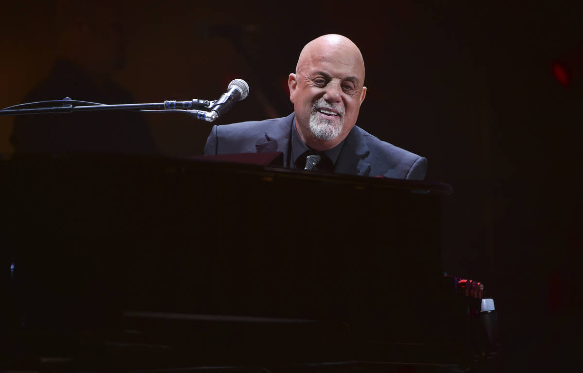 Musician Billy Joel performs during his 100th lifetime performance at Madison Square Garden on ...