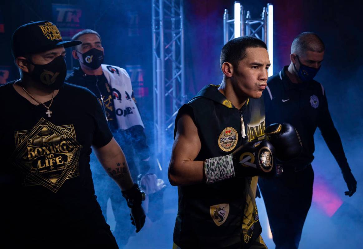 Oscar Valdez, front/right, enters the ring before the start of his jr. lightweight fight with J ...