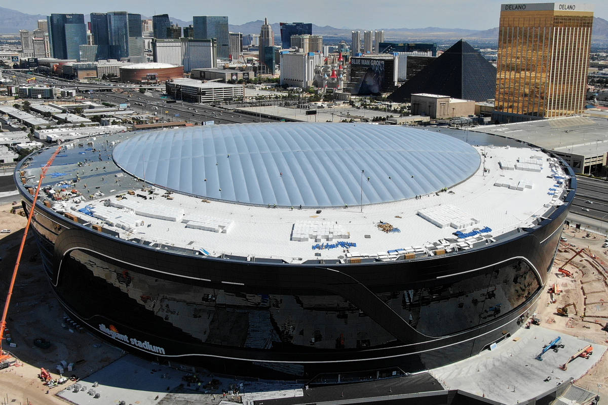 Aerial view of Allegiant Stadium with completed ETFE roof panel installation on Friday, April 1 ...