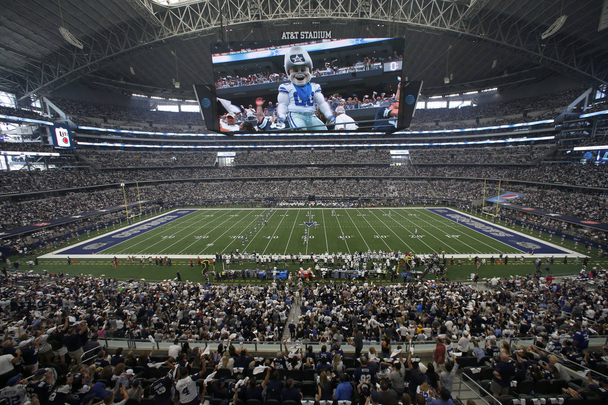 Rowdy, the Dallas Cowboys mascot is displayed on the large video screen at AT&T Stadium at ...
