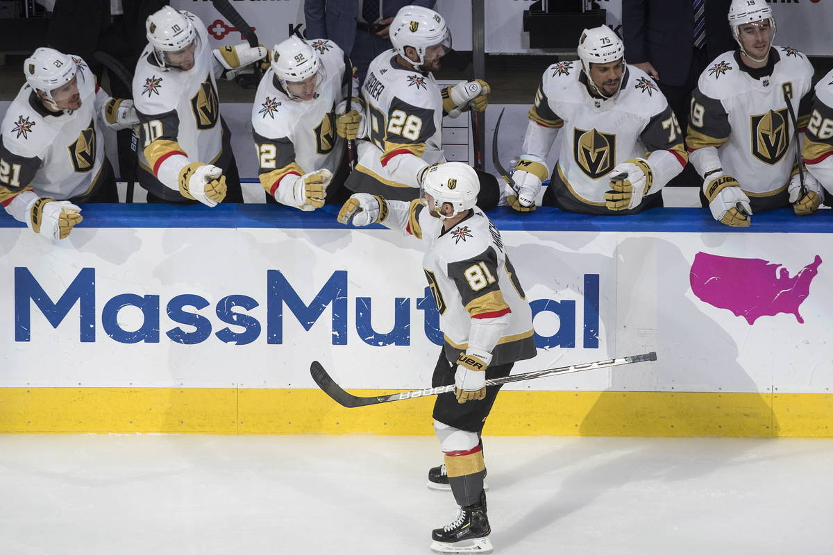 Vegas Golden Knights' Jonathan Marchessault (81) celebrates a goal with teammates during third ...