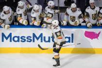 Vegas Golden Knights' Jonathan Marchessault (81) celebrates a goal with teammates during third ...