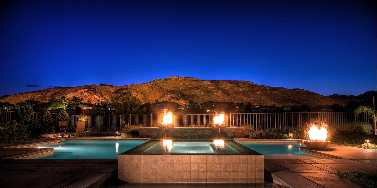 This geometric pool has fire features and a spa. (Premier Pools and Spas)