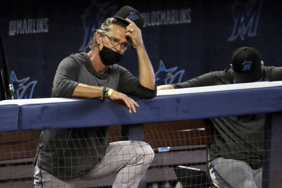 FILE - In this Sunday, July 12, 2020, file photo, Miami Marlins manager Don Mattingly watches a ...