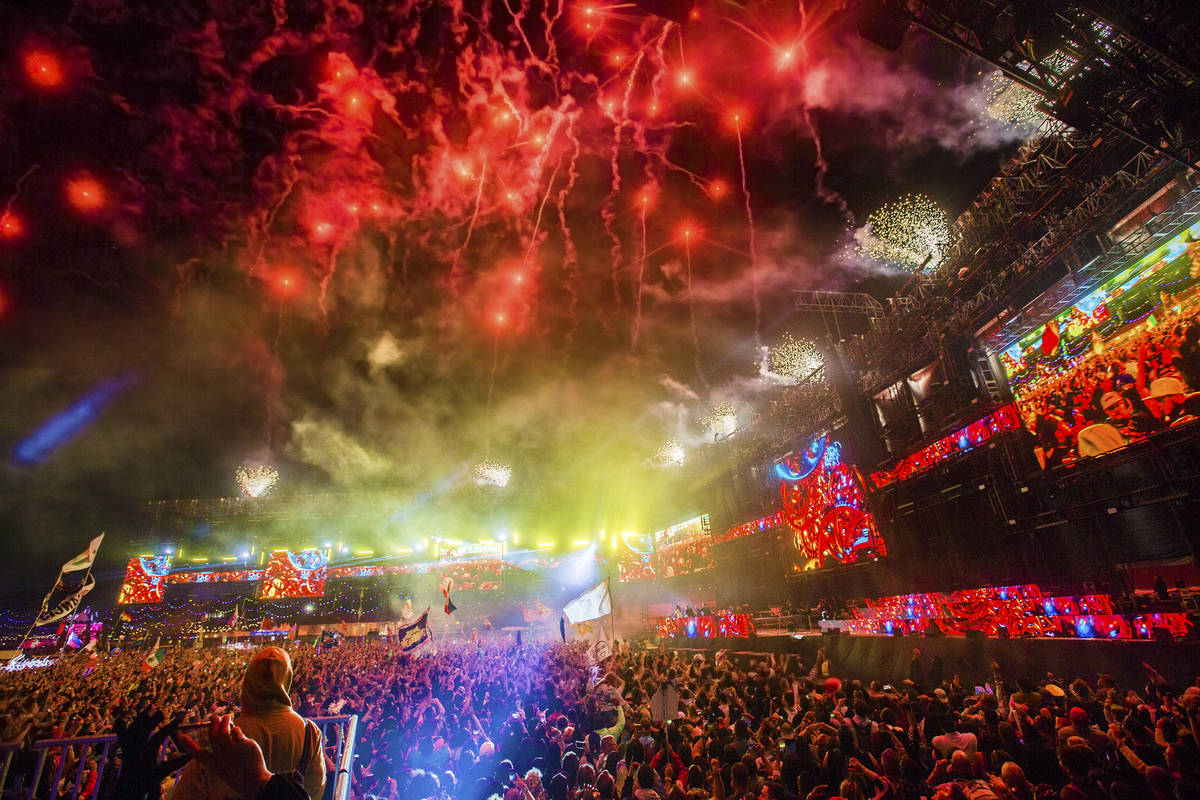Fireworks light up the sky during Steve Aoki's performance at the Circuit Grounds stage on day ...