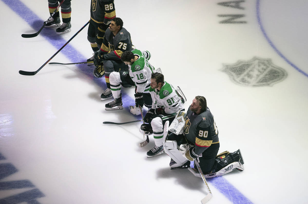 Dallas Stars' Jason Dickinson (18), Tyler Seguin (91) and Vegas Golden Knights' Ryan Reaves (75 ...