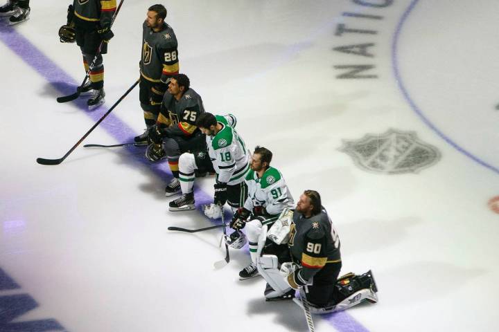 Dallas Stars' Jason Dickinson (18), Tyler Seguin (91) and Vegas Golden Knights' Ryan Reaves (75 ...