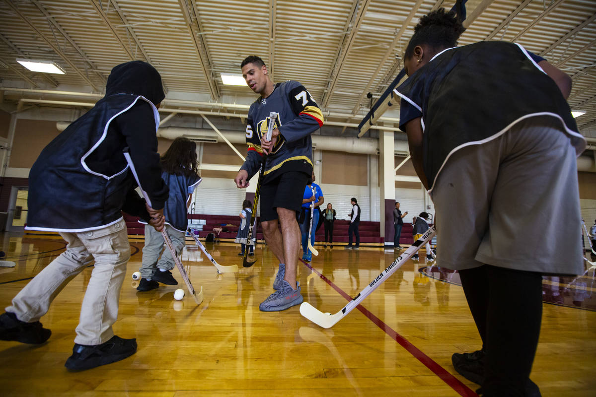 Golden Knights forward Ryan Reaves helps lead a youth street hockey clinic at Doolittle Recreat ...
