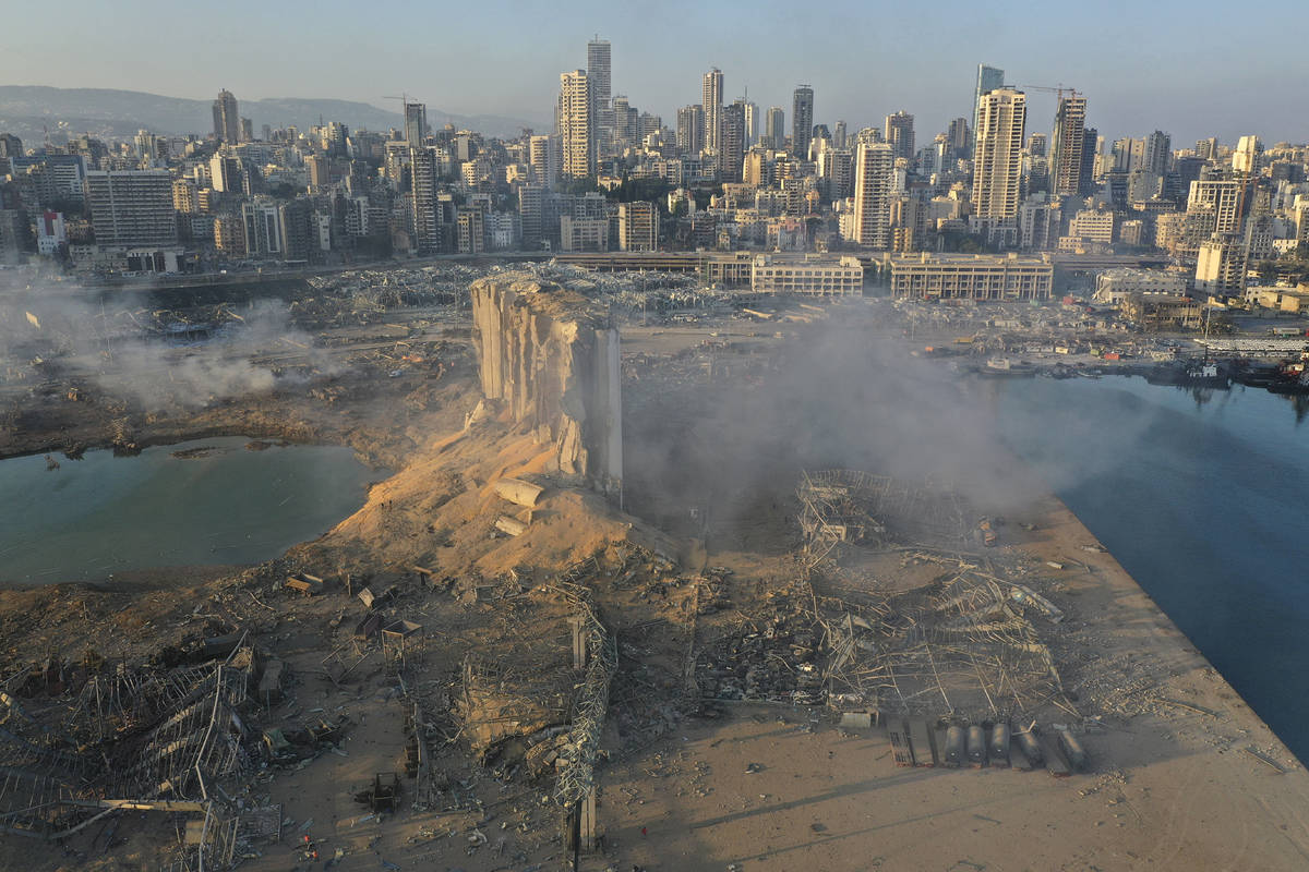 A drone picture shows the scene of an explosion at the seaport of Beirut, Lebanon, Wednesday, A ...