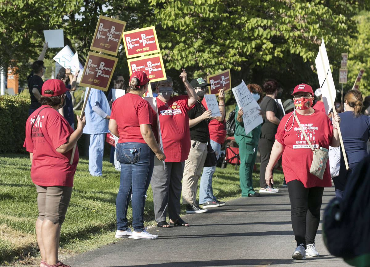 Nurses and supporters picket outside of St. Rose Siena Hospital calling for more nurses to impr ...