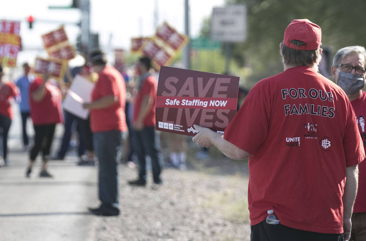 Nurses and supporters picket outside of St. Rose Siena Hospital calling for more nurses to impr ...