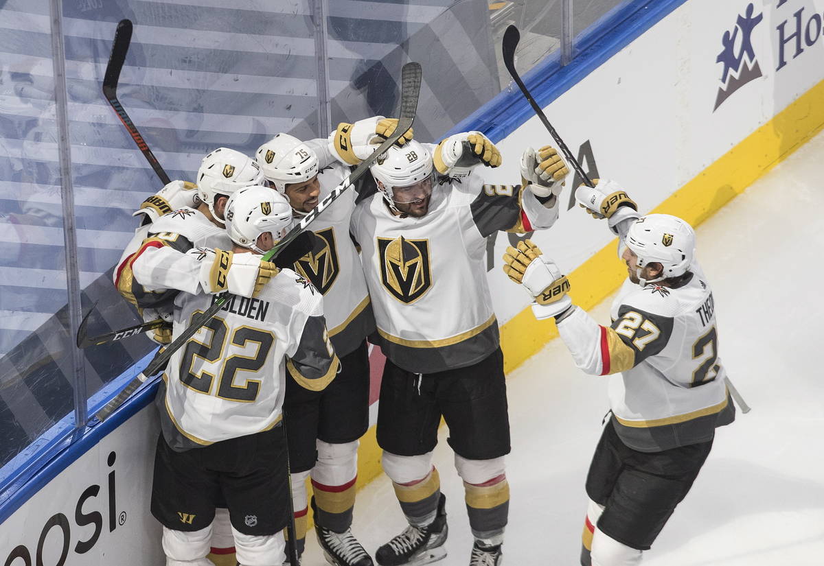 Vegas Golden Knights celebrate a goal during the econd period of an NHL Stanley Cup hockey qual ...