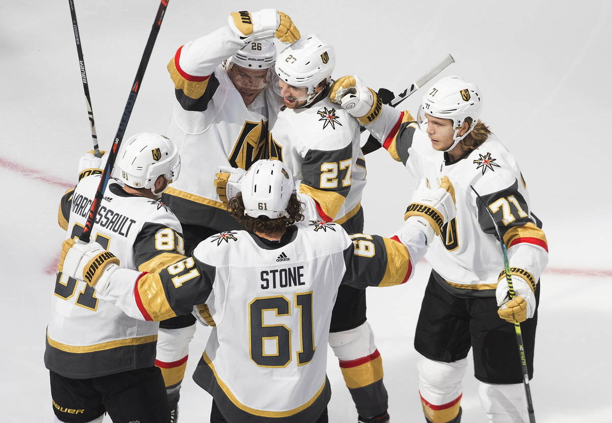 Vegas Golden Knights celebrate a goal during the second period of an NHL Stanley Cup qualifying ...