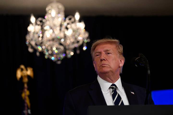 President Donald Trump speaks at Trump National Golf Club Bedminster in Bedminster, N.J., Frida ...