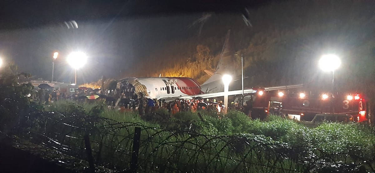 The Air India Express flight that skidded off a runway while landing at the airport in Kozhikod ...