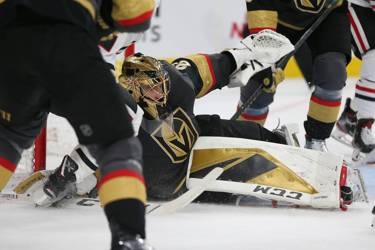 Vegas Golden Knights goaltender Marc-Andre Fleury (29) defends a shot from the Chicago Blackhaw ...