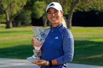Danielle Kang poses with the trophy after winning the Marathon Classic LPGA golf tournament Sun ...