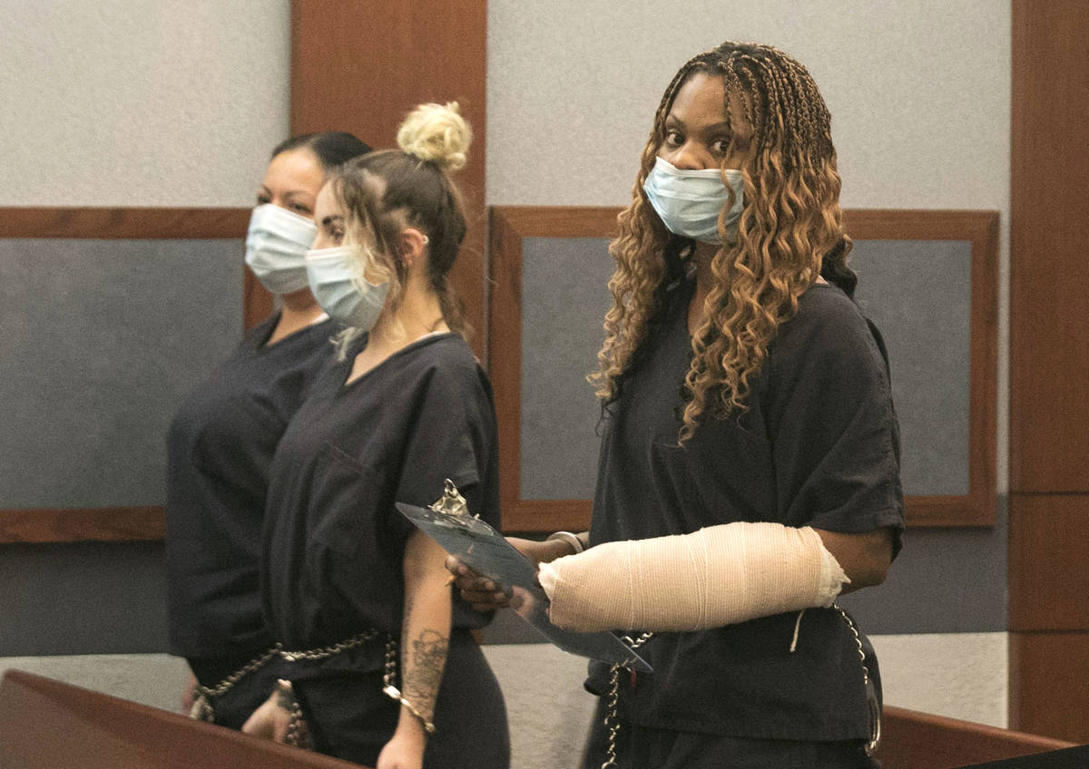 Ebone Whitaker, right, charged with DUI in crash that left two teens dead, appears in court at ...