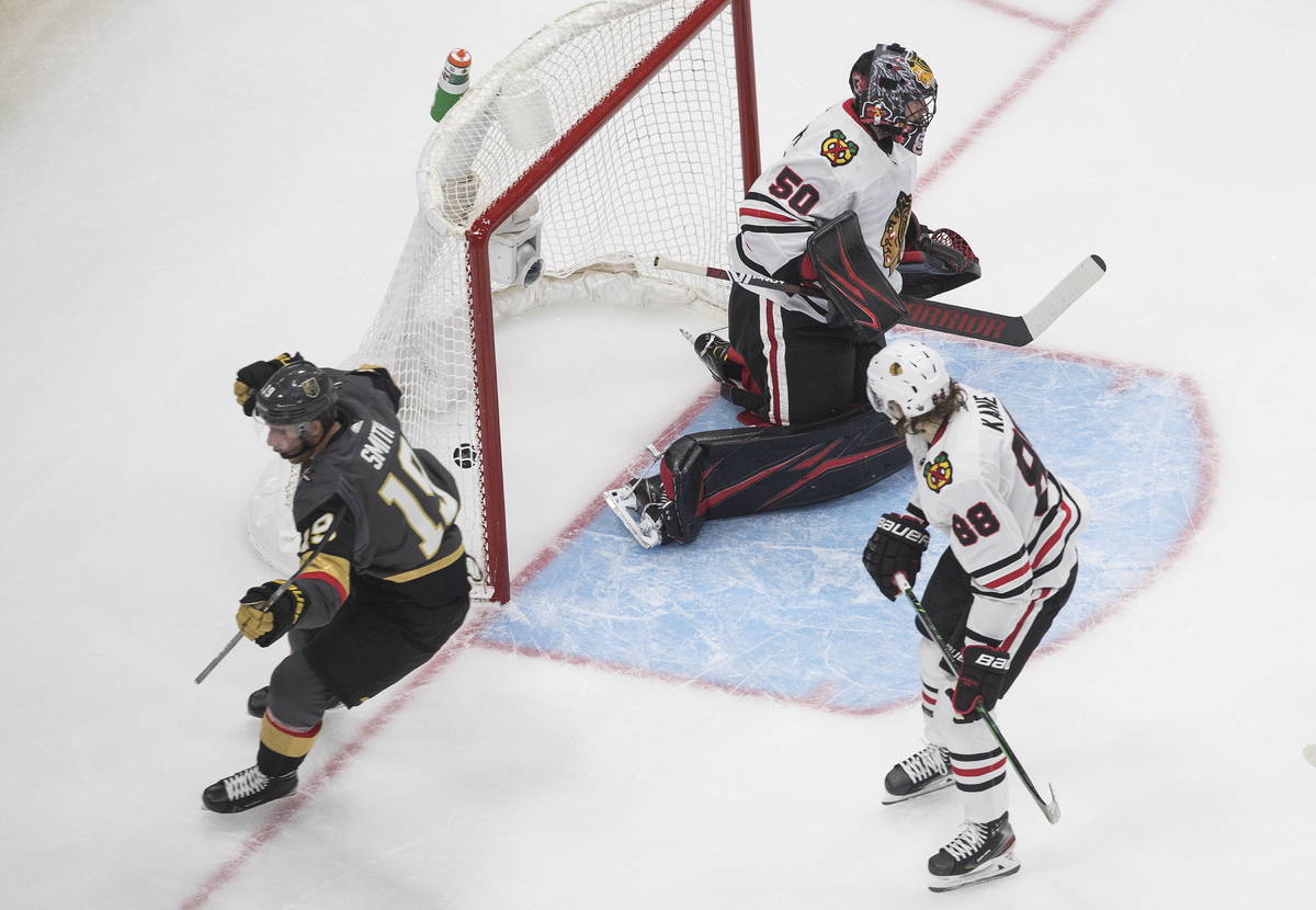 Chicago Blackhawks goalie Corey Crawford (50) allows a goal to Vegas Golden Knights' Reilly Smi ...