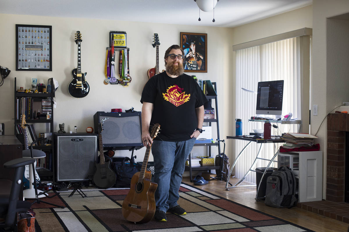 Paul Kleemann, a guitar director at Del Sol Academy, at his home in Las Vegas in Las Vegas, Tue ...