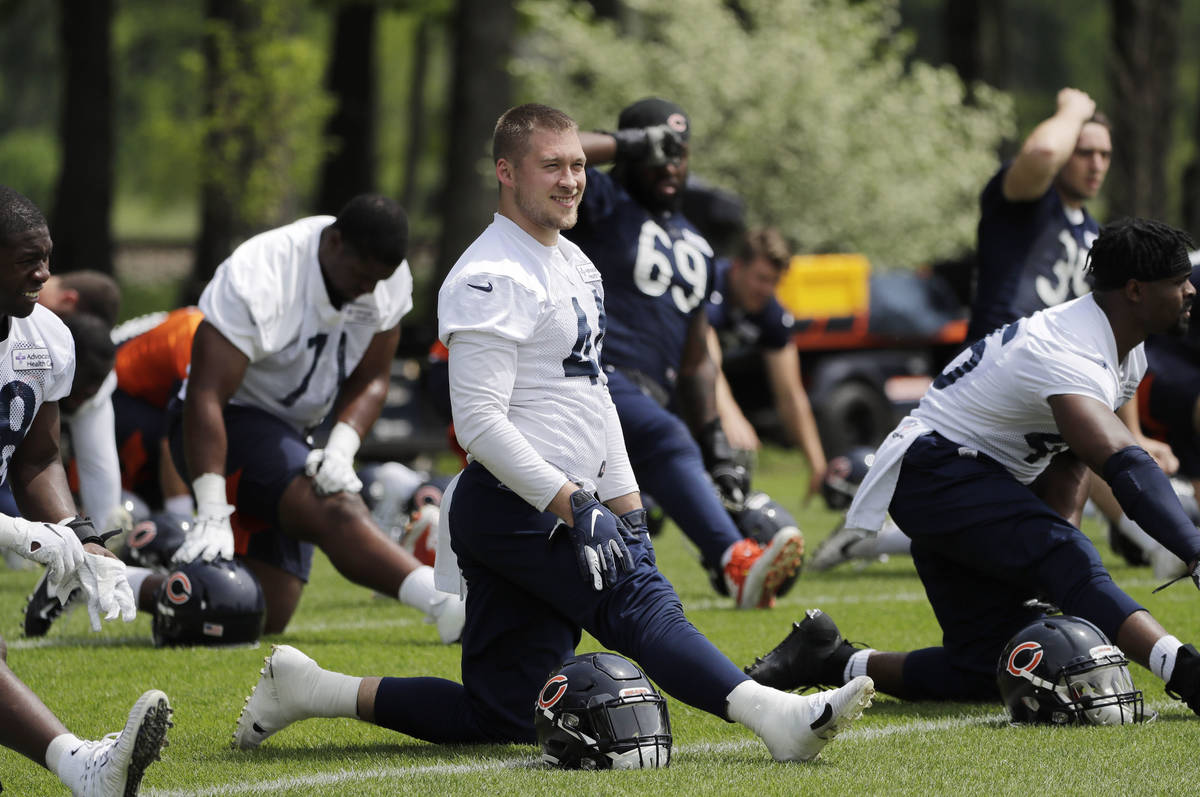 In this June 4, 2019, file photo, Chicago Bears linebacker Nick Kwiatkoski (44) warms up with t ...